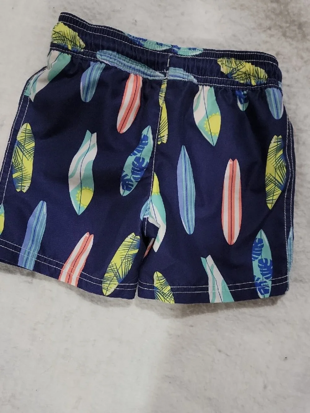 Carter's Navy Swim Trunks with Colorful Surfboard Print